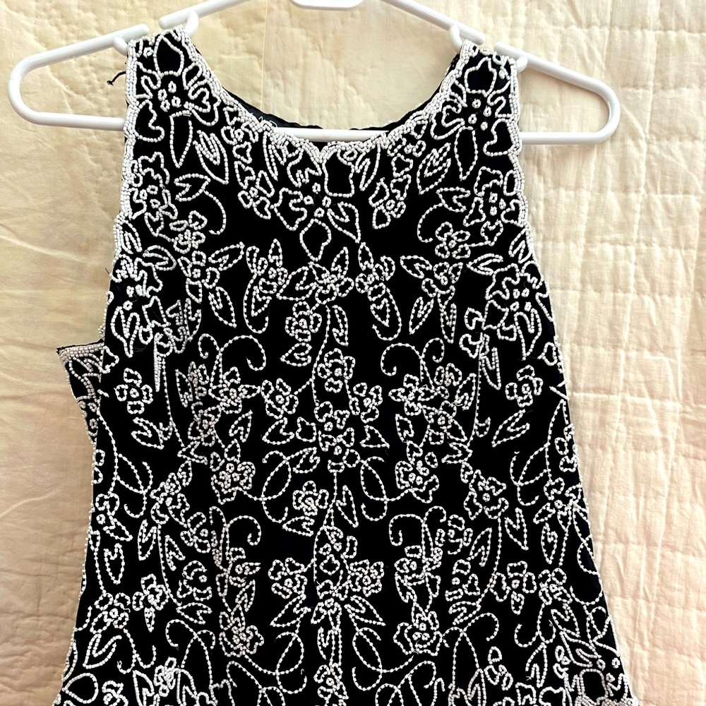 Black with white beaded design